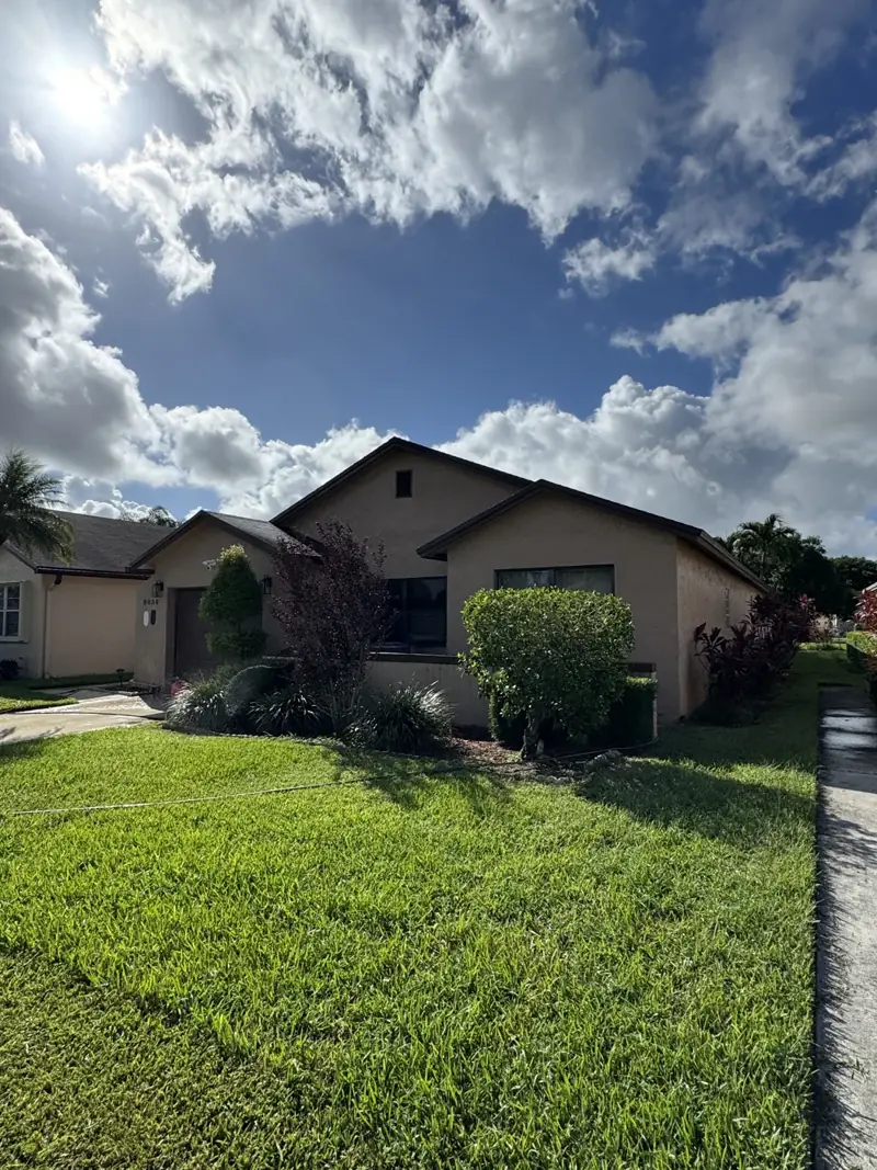 Existing beige exterior before painting at a Boca Raton home